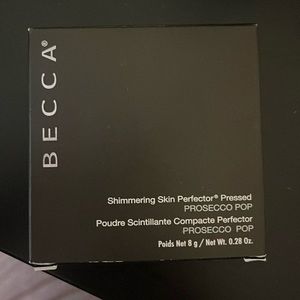 New BECCA highlighter. Never used before. In the box.